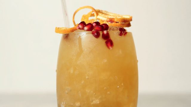 Mandarin And Pomegranate Golden Cobbler Cocktail